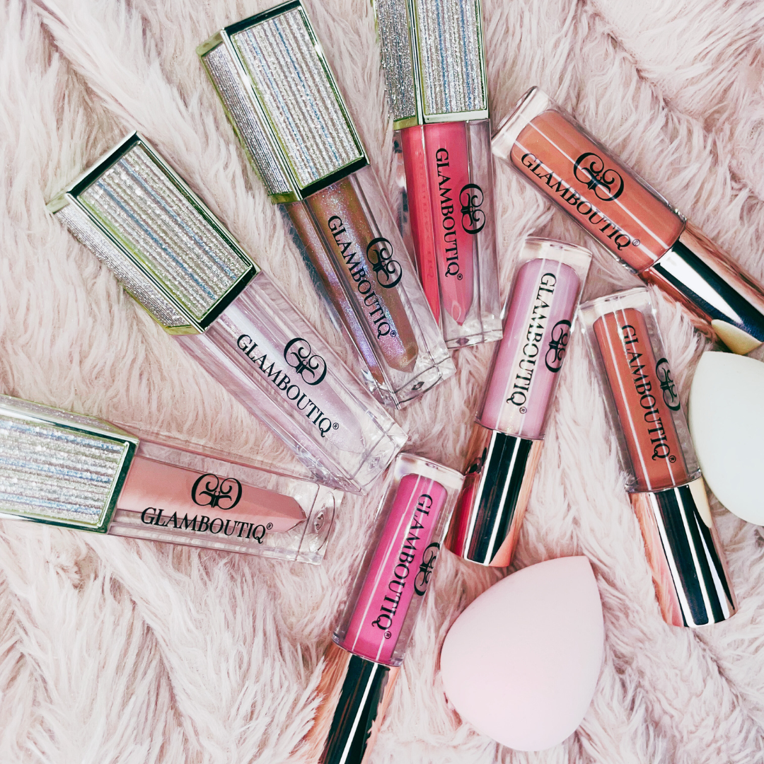 Lipgloss in a bold Doll Drama shade for a dramatic, high-shine finish