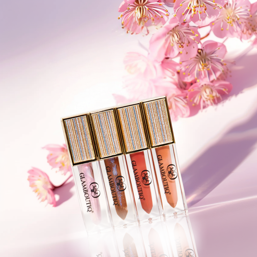 Lipgloss in a bold Doll Drama shade for a dramatic, high-shine finish